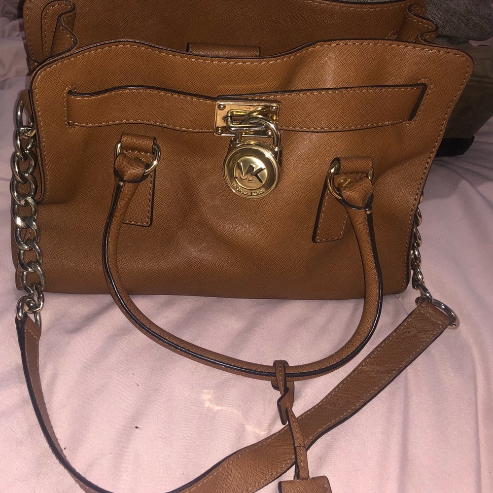 Michael Kors brown leather bag.